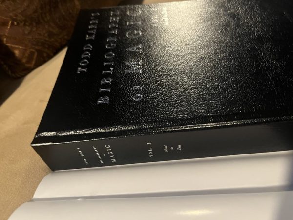 The foil-stamped spine and cover of Todd Karr's Bibliography of Magic.